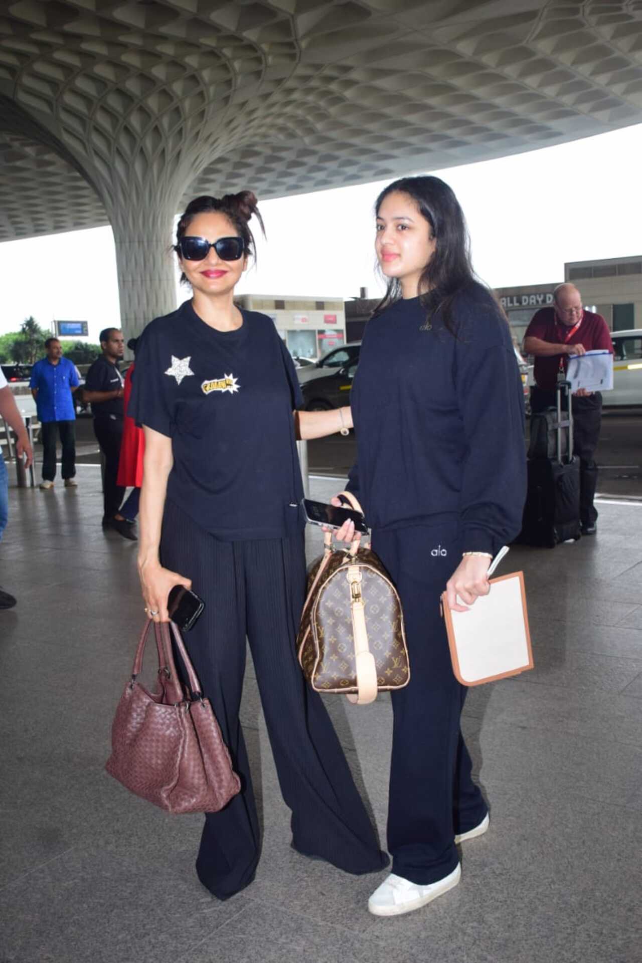 Actress Madhu spotted with her daughter at the airport