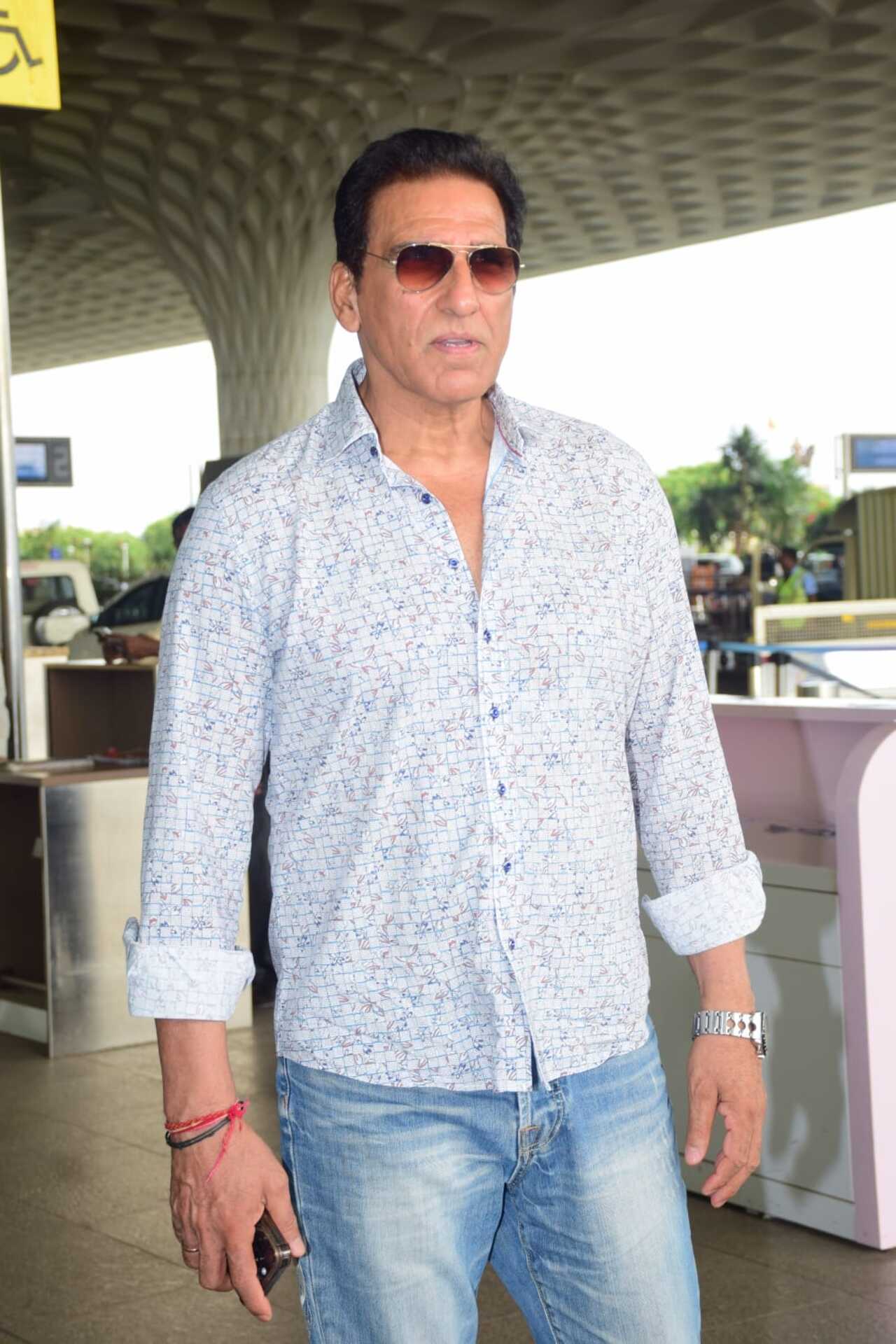 Actor Mukesh Rishi spotted at the airport. In the 80s and 90s, he shot to fame playing the bad guy in movies