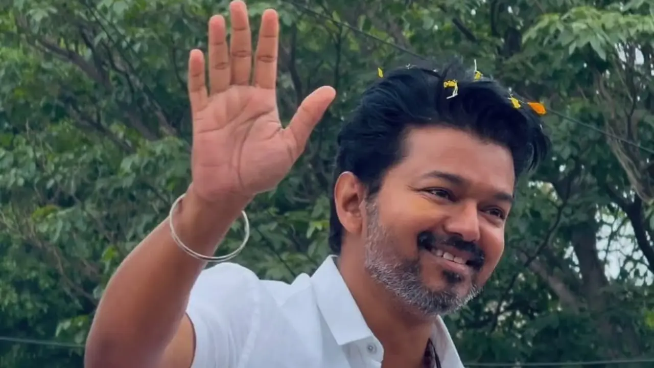 In a dramatic moment, Thalapathy Vijay's security guard pointed a gun at a fan who attempted to come close to the actor. Read full story here