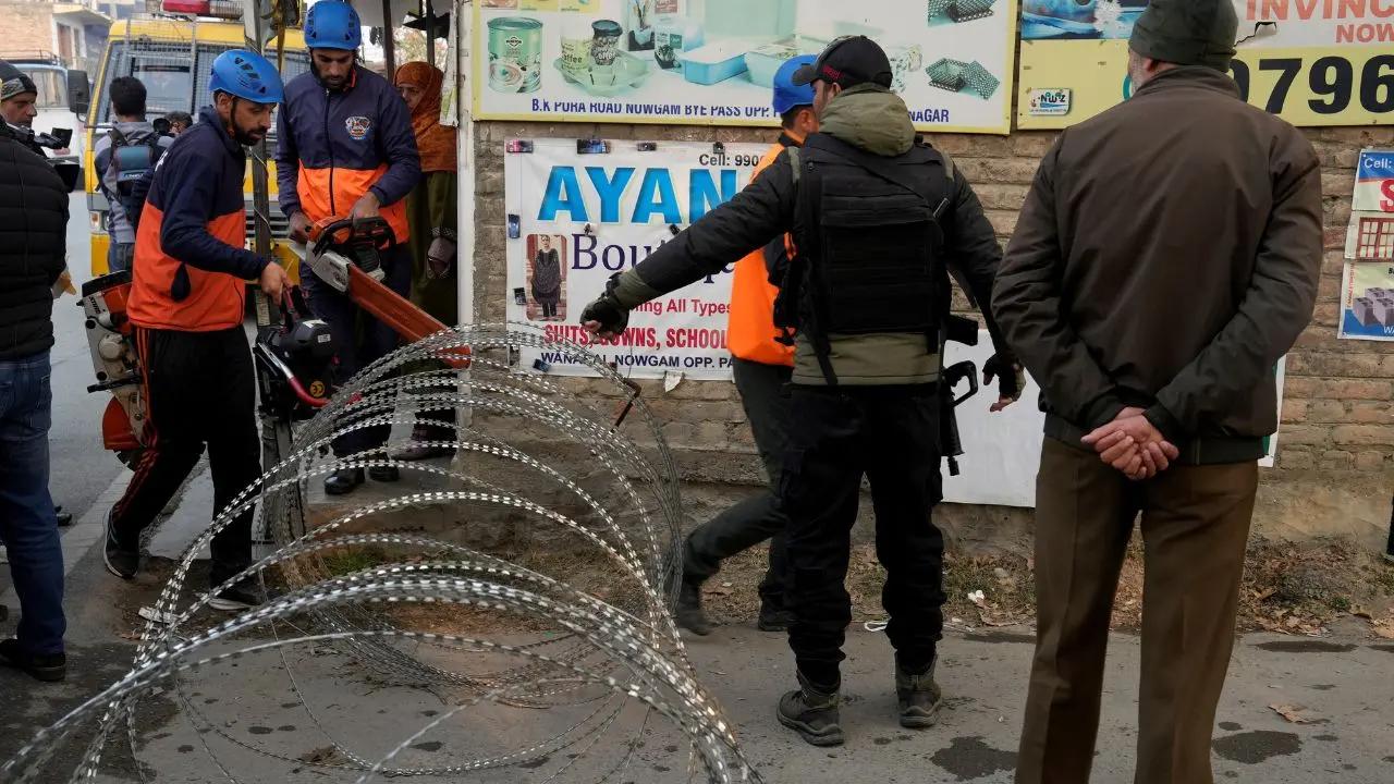 SDRF personnel arrive to clear the debris after an accidental explosion ripped through Nowgam police station on late Friday night, in Srinagar