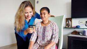 Here's how Indians are using technology to spark joy, memory, and connection Pallavi Jha (left) delighted her househelp Puja Aware (right) with AI-generated pictures of her ‘on holiday’. Pic/Atul Kamble