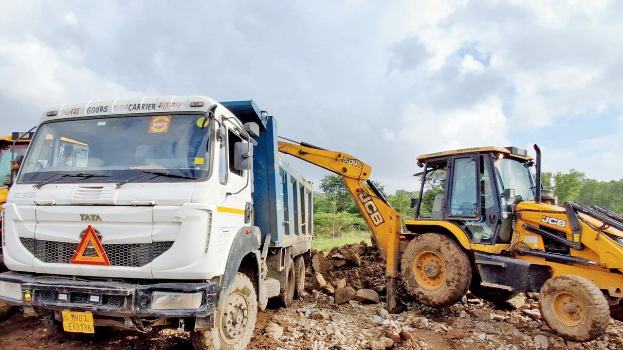 Mid-Day Impact: Authorities clear Aarey Milk Colony land of illegal debris The authorities clear the forested area in Aarey Milk Colony on Sunday, where debris and mud had been illegally dumped. Pic/By Special Arrangement