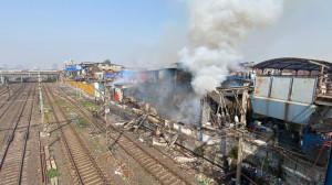 In Photos: Major blaze in huts close to Mumbai local train tracks