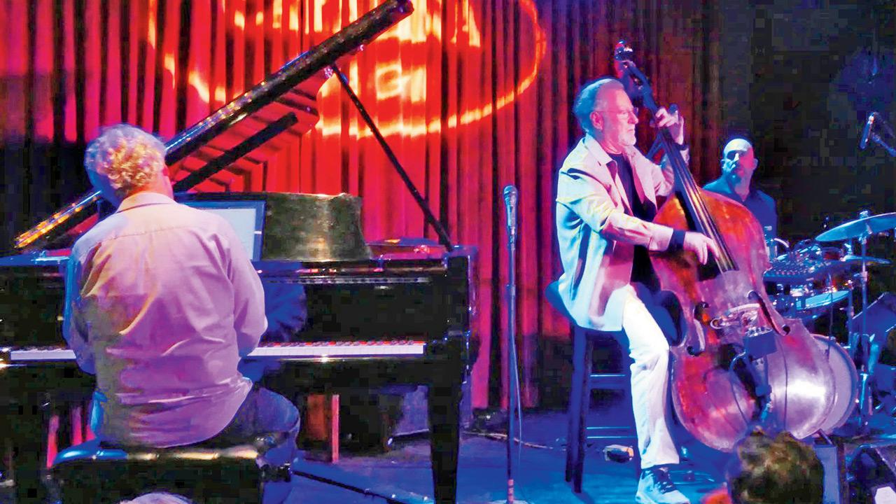 Brian Bromberg (right) plays the cello at a session.  Pic Courtesy/Brianbromberg.net