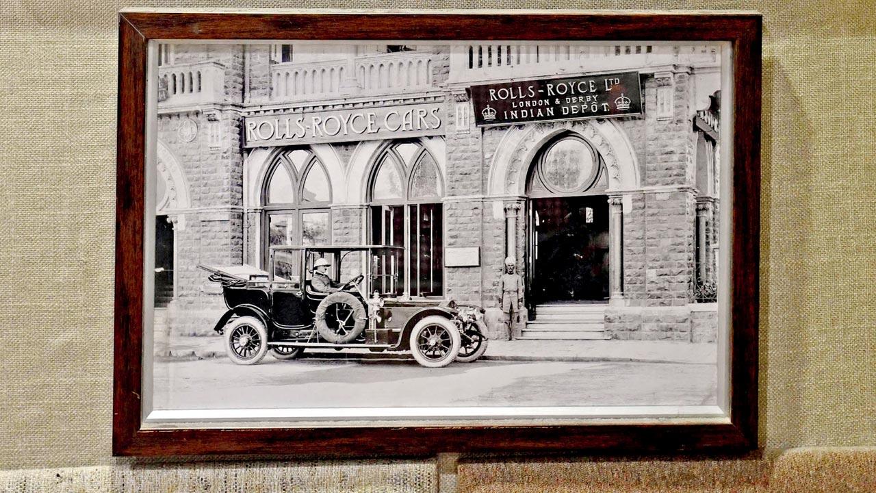 The 1915 photograph of a car outside the shop’s property, when it was a Rolls-Royce store