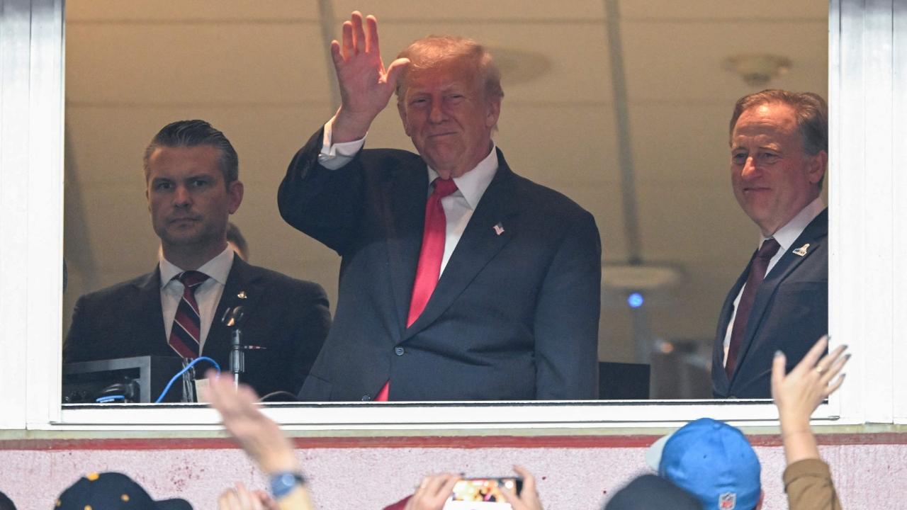 There were boos from some spectators in the stands when Trump was shown on the videoboard late in the first half, standing in a suite with House Speaker Mike Johnson, and again when the president was introduced by the stadium announcer at halftime