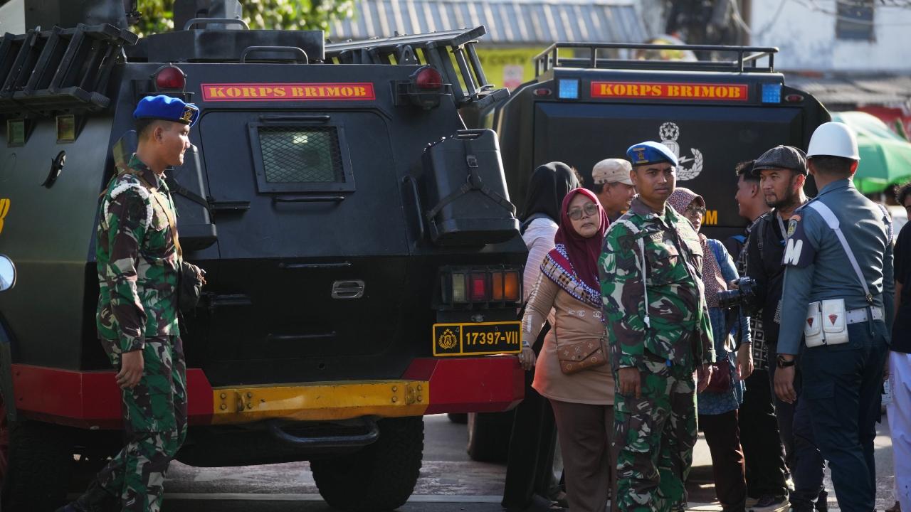 Students and others ran out in panic as gray smoke filled the mosque.
