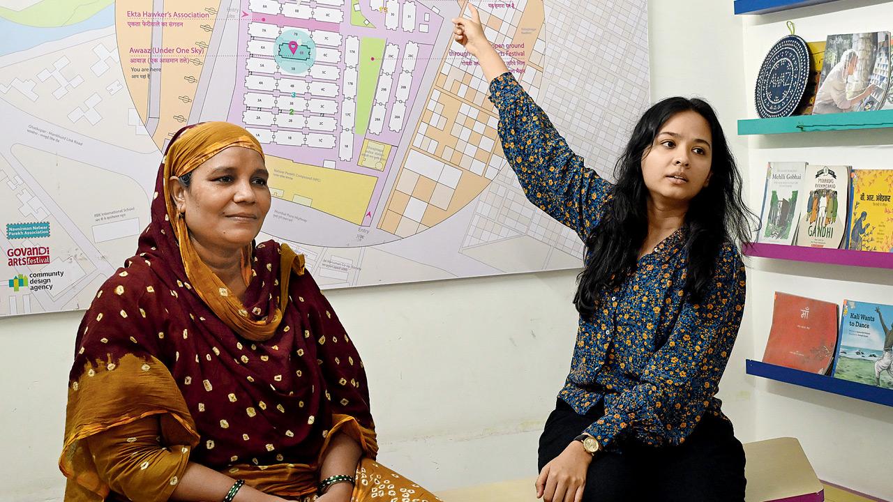 Parveen Shaikh (left) and Natasha Sharma show us a detailed map of Natwar Parekh Compound; PICS/SAYYED SAMEER ABEDI