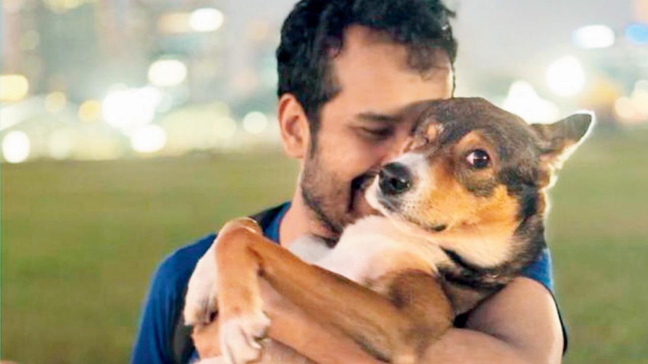 Shah with his pet dog, Bagel
