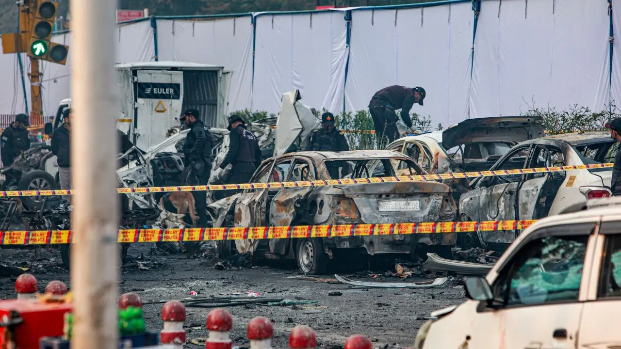 Delhi Red Fort blast: Toll in blast near Red Fort rises to 12 Charred remains of vehicles at a cordoned off area following a blast that occurred near Red Fort Metro Station on Monday. Pic/PTI