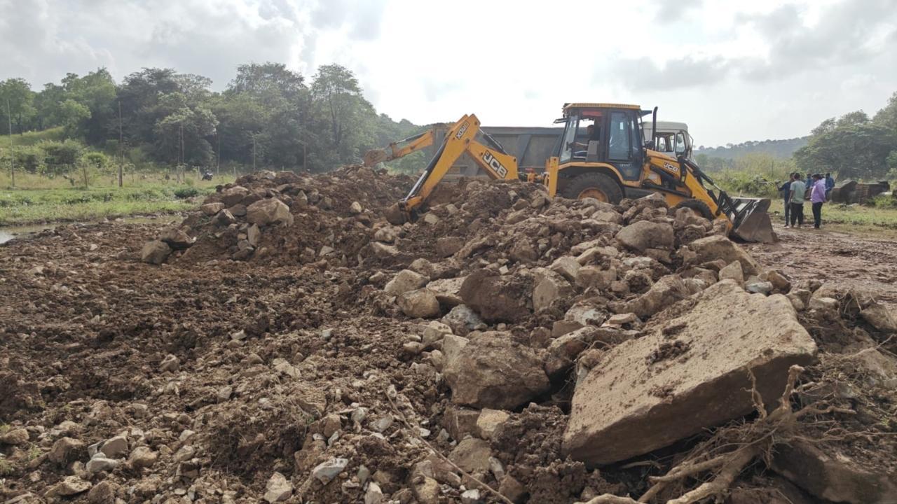 Mid-day impact: Officials rush to clear illegally dumped mud and rocks from Aarey forest land