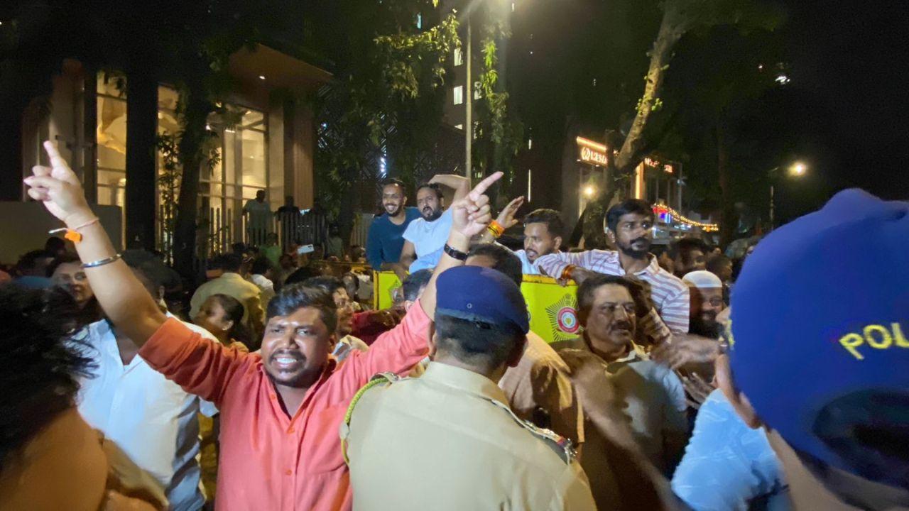 Supporters of BJP's Ameet Satam outside his Andheri office on Saturday evening. PIC/ SHADAB KHAN