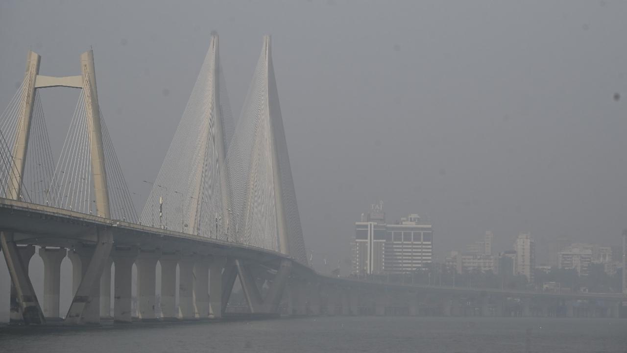 Moist air and low wind speeds have prevented the usual coastal breeze from dispersing pollutants, leaving a persistent haze over the city