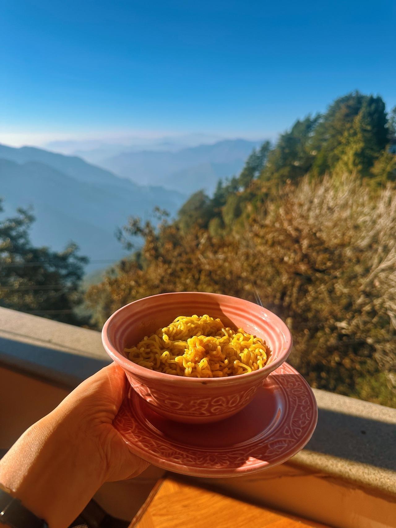 <p>Nothing beats a hot bowl of pahadon wali Maggie, especially when it`s all cool all around. And if you have the view of snow-clad mountains, a picture like this is a must.</p>