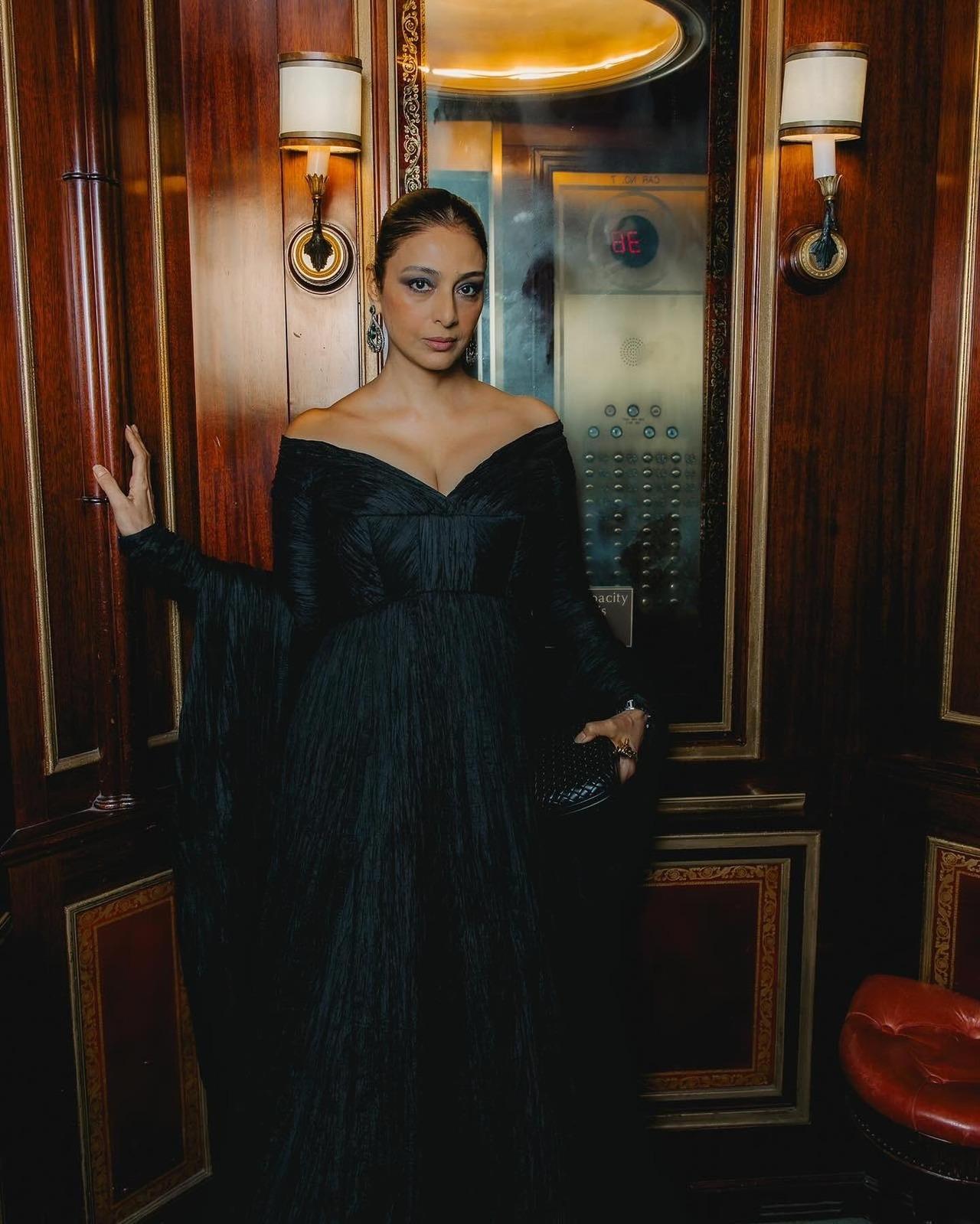 Nothing suits Tabu like black does. Tabu made heads turn at the red carpet in this black off-shoulder gown, pairing it with a sleek hairstyle and statement earrings.