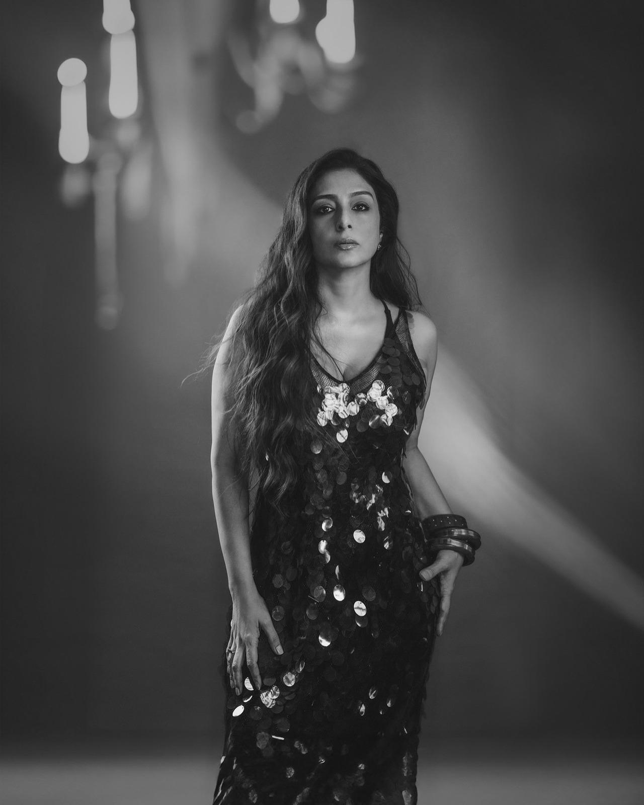 Tabu shines (quite literally) in this black sequinned dress that is sultry, glamorous and effortless all in one.