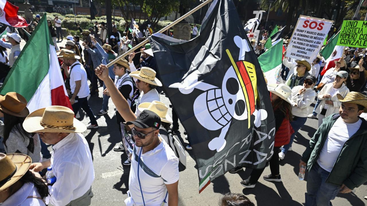 <p>One Piece&rsquo;s Straw Hat pirate flag &mdash; a skull in a straw hat &mdash; has become a global Gen-Z symbol of freedom and defiance. First introduced in Eiichiro Oda&rsquo;s 1997 manga, the flag in the series stands for Luffy&rsquo;s fight against oppression and corrupt authority. Today, protesters worldwide are using it as a simple, universal symbol of rebellion and the demand for change. Here are glimpses of its appearance in global protests.</p>
<p><strong>Mexico</strong><br />In recent protests, Gen-Z protesters used the Straw Hat Pirates&rsquo; Jolly Roger to speak out against widespread drug-related violence &mdash; which claims tens of thousands of lives each year &mdash; and to criticise the security policies of Mexican President Claudia Sheinbaum.</p>