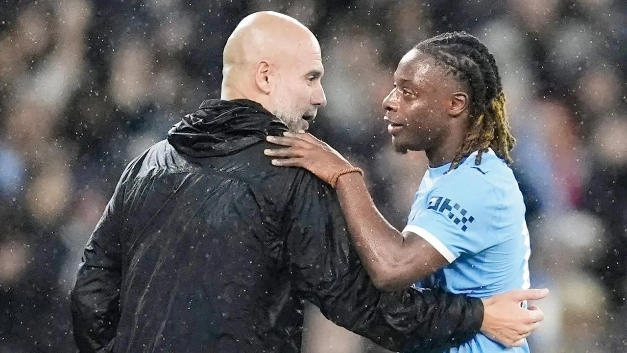 Man City boss Pep Guardiola (left) with Jeremy Doku on Sunday. Pic/Getty Images