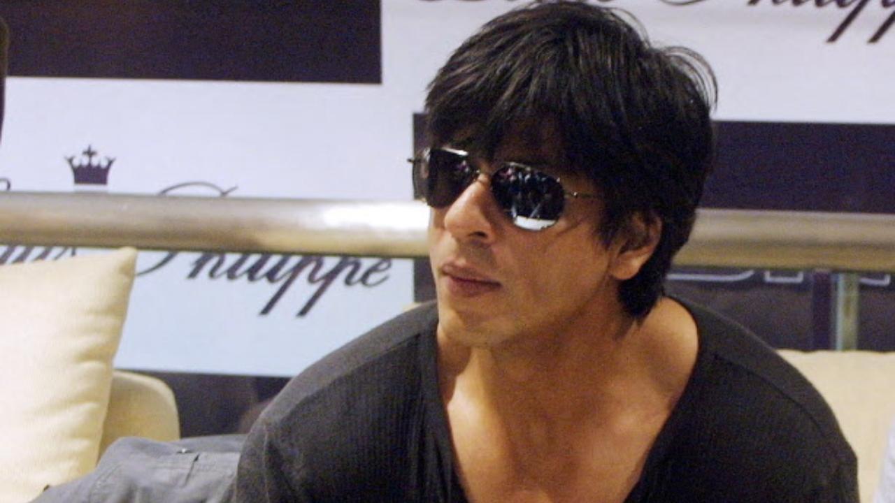 For Don promotions, Shah Rukh Khan sported a messy layered haircut with long fringes falling over his forehead, giving him a cool, rebellious edge.