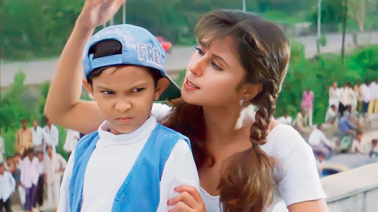 (L-R) Aditya Narayan and Urmila Matondkar in the iconic title track. Pics/PTI, Instagram, Youtube
