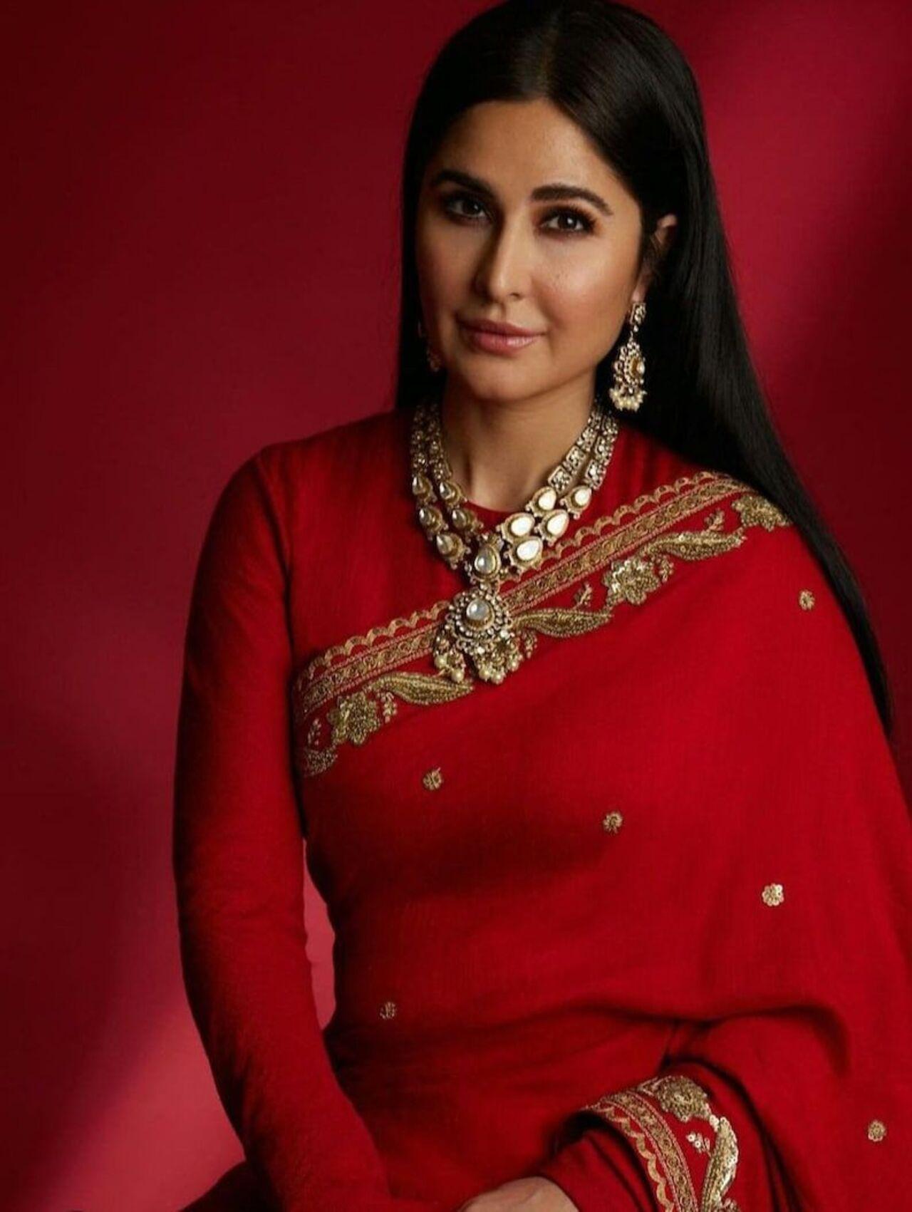 Katrina Kaif goes overboard and shines bright in this polki jewellery set that perfectly complements her sindoori red saree and blouse.