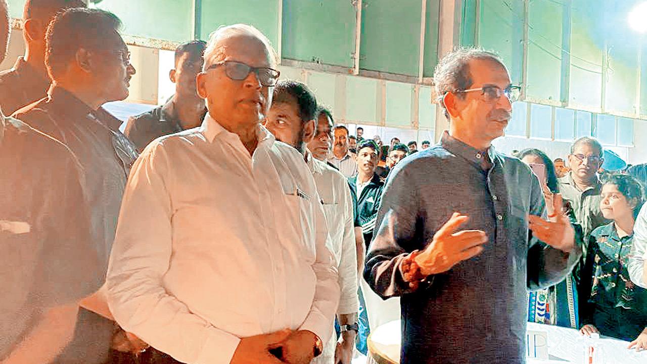 (From left) Chandrakant Pujari with Uddhav Thackeray at the Worli shooting range. PIC/BY SPECIAL ARRANGEMENT