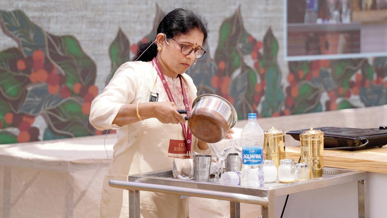 A participant takes part in a filter coffee making challenge