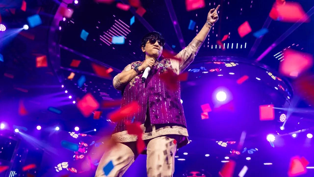 Dressed in complete white, Falguni donned an off-white jacket that was embroidered with gold, red and pink designs, along with a white kurti and pants