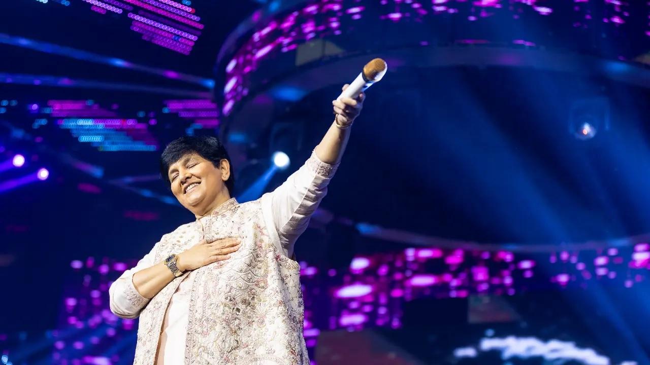 Dressed in complete white, Falguni donned an off-white jacket that was embroidered with gold, red and pink designs, along with a white kurti and pants