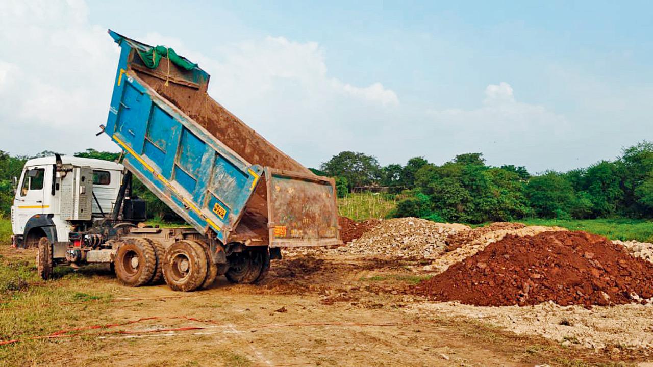 According to locals, stones, earth, and murum soil were being dumped near Maroshi Pada in Aarey Milk Colony. PICS/By Special Arrangement