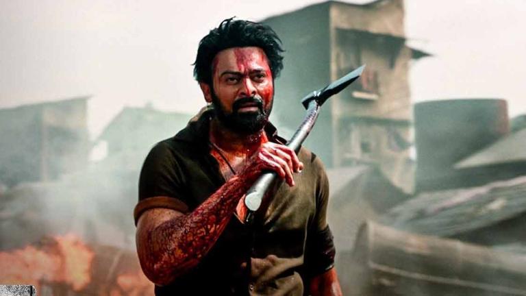 Salaaar (2023)
In Salaar, Prabhas portrays Deva, a man of immense power and a brutally violent past who now lives a life of determined, ritualistic restraint. His performance is defined by a silent, brooding intensity, in contrast to the more dialogue-heavy roles he has played before