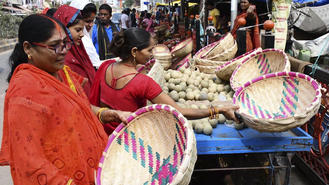 PrayagrajPeople purchasing bamboo baskets at a market for Chhath Puja festival rituals on Sunday, October 26, 2025.