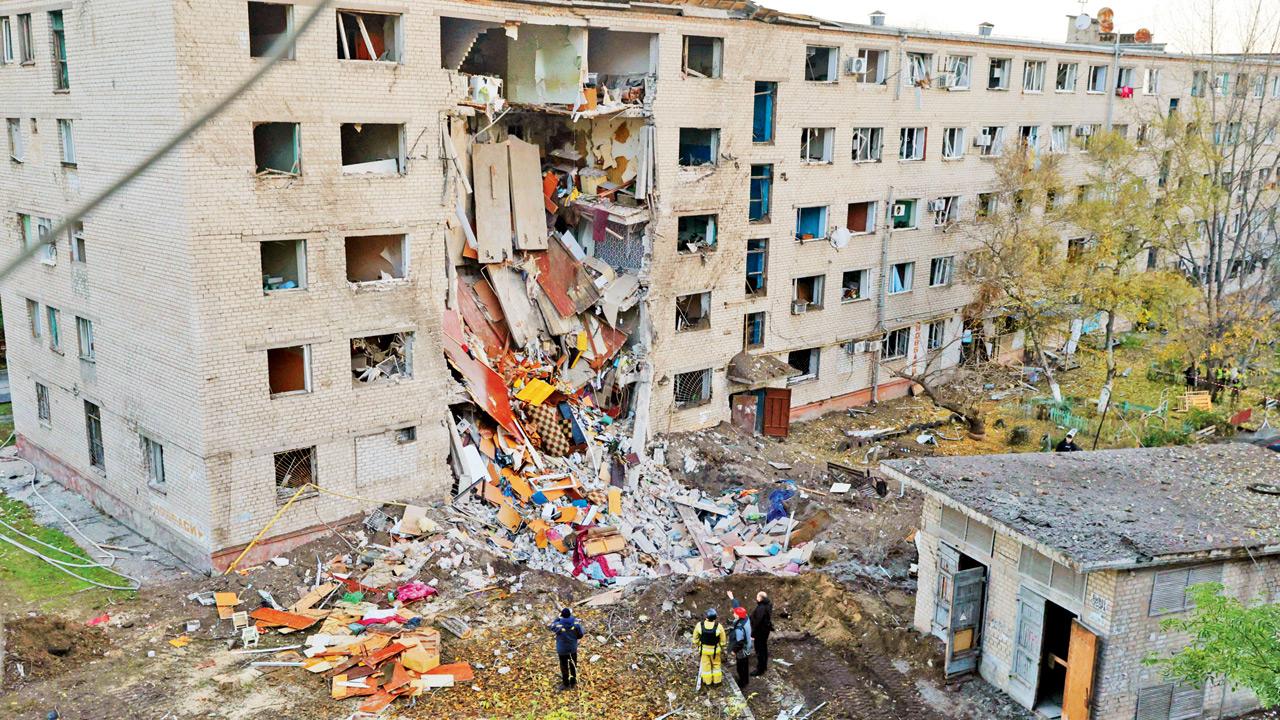 Russia fires 650 drones on Ukraine, causes blackouts Ukrainian rescuers at the site of a heavily damaged building following a Russian attack in Zaporizhzhia, on Thursday. PIC/GETTY IMAGES