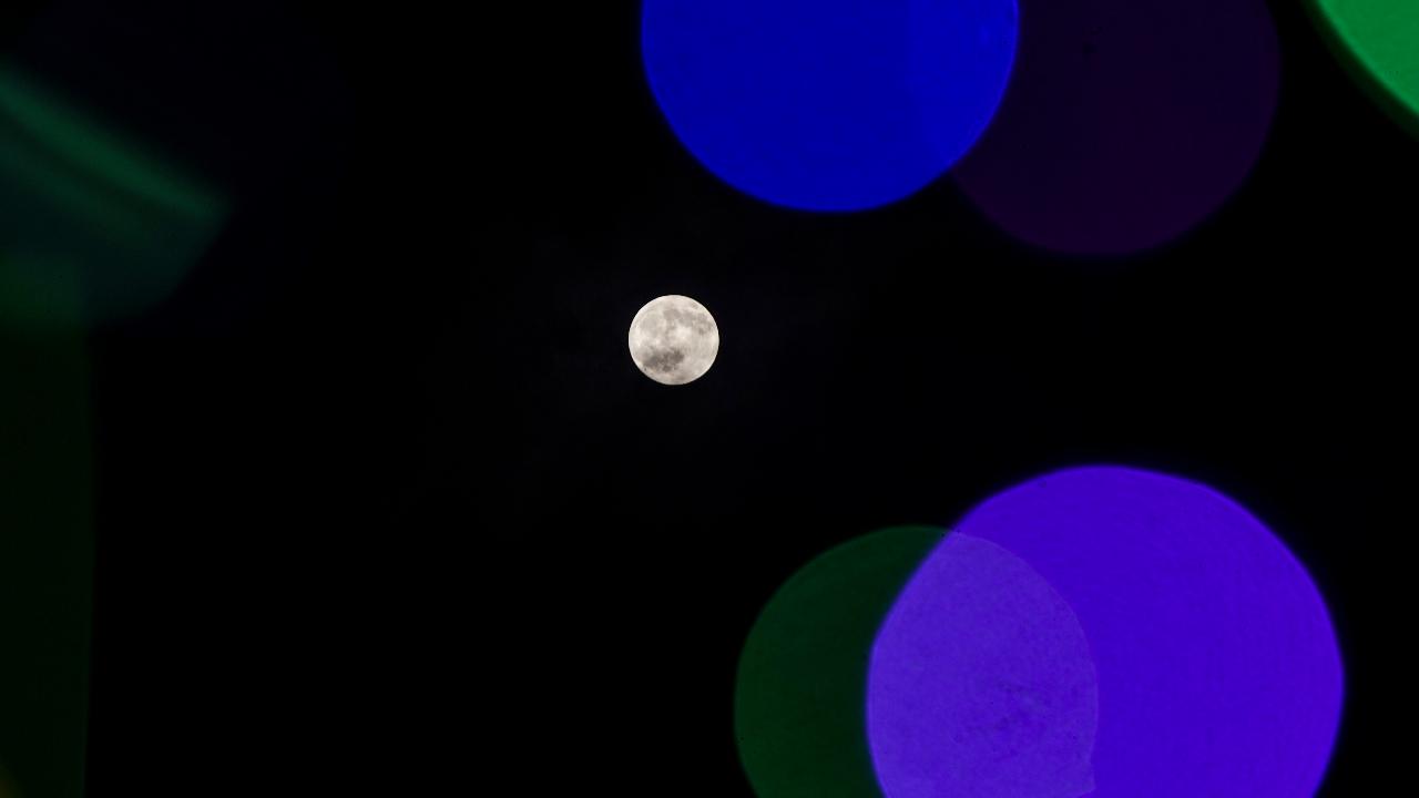 Locals in Rajasthan witness the Supermoon on 'Sharad Purnima' from Ajmer on Monday, October 6 in India