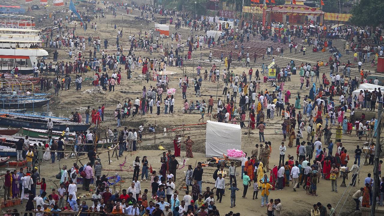 VaranasiPeople gathering to perform Chhath Puja festival rituals at Assi Ghat.