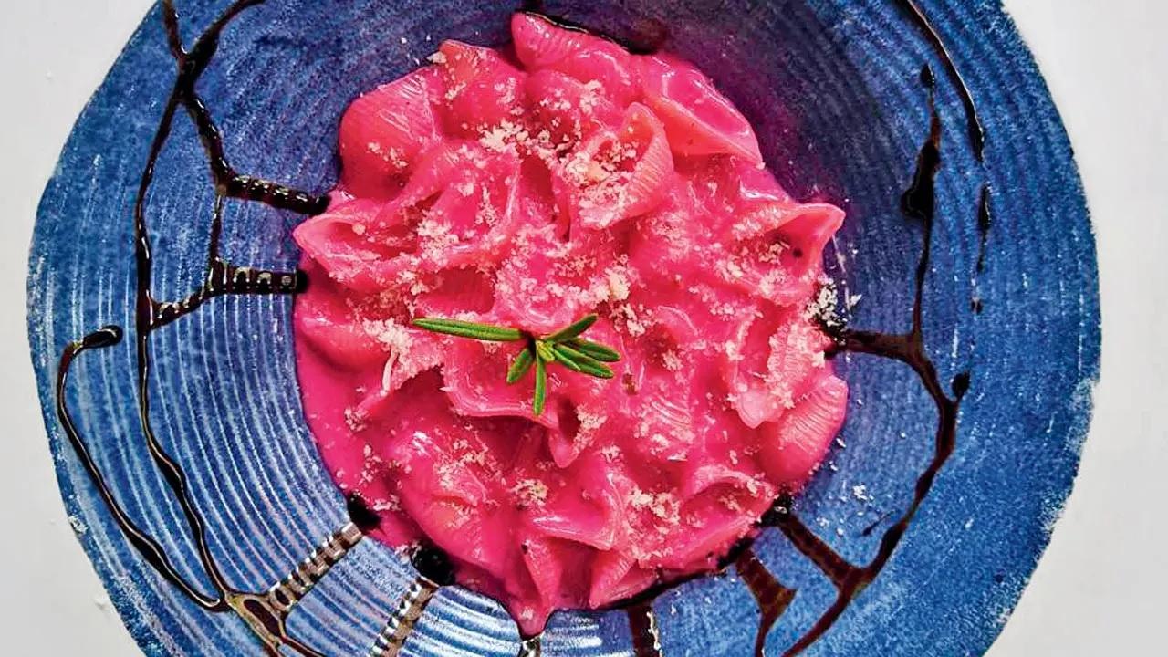 Creamy Beetroot PastaIngredients. ½ cup cooked Beetroot (peeled). 150 gm Conchiglie pasta. 1 Garlic clove (chopped). 2 tbsp Olive oil. ¼ cup Cream / Ricotta cheese. 2 tbsp Parmesan Cheese. Salt and Black pepper (to taste). Basil and Parsley (for garnish)
MethodCook the penne pasta in salted boiling water until al dente. Drain and set aside. In a pan, heat olive oil over medium-low heat. Sauté garlic until golden, and set aside. In a blender, combine the cooked beetroot, ricotta cheese or cream, and a splash of the pasta water. Blend until smooth. Return the blended sauce to the pan, heat gently, and stir in the cooked pasta until well coated. Add salt and pepper as per taste. Garnish with fresh herbs and Parmesan. Serve hot.
Recipe courtesy: Chef Jasjit Singh Keer, Alfredo’s
Also try
. Fusilli with Porcini and Button Mushroom SauceAt Amazonia, Unit 5, Godrej BKC, BKC.Call 8828884042Cost Rs 575
. Spaghetti Marinara PastaAt SAZ American Brasserie, Ground Floor, JIO World Drive, BKC.Call 9920056686Cost Rs 625 onwards
. Linguini PescatoreAt Toscano, Veera Desai Industrial Estate, Andheri West (also Navi Mumbai, Ghatkopar)Call 7204184101Cost Rs 875