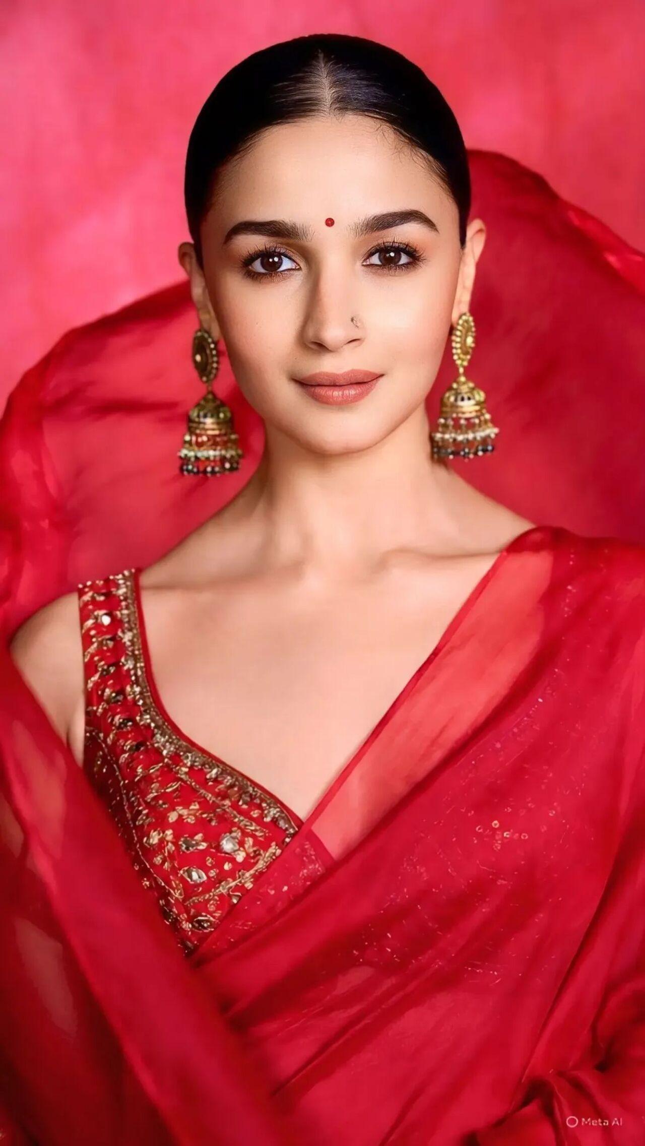 Alia Bhatt keeps it simple yet classy in these beautiful jhumkas, baring her neck for an elegant look.