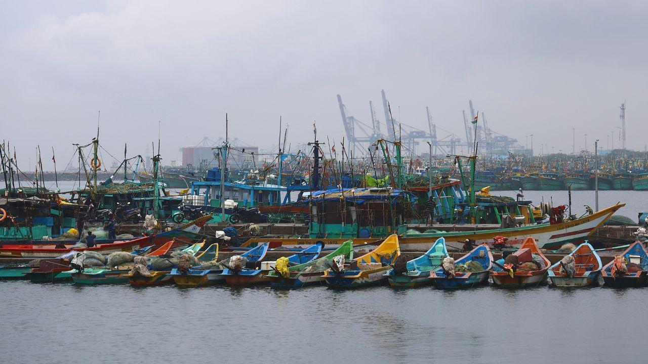 Boats remain anchored at Visakhapatnam fishing harbour on Monday as heavy rainfall lashed the city amid high tidal waves as Cyclone Montha gained in strength