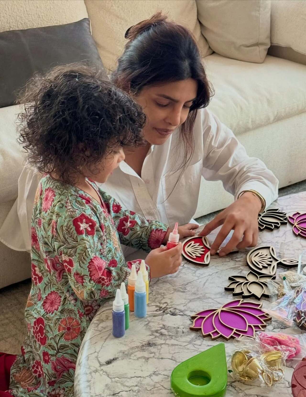 Mornings filled with rangolis and pretty preps for the Diwali party