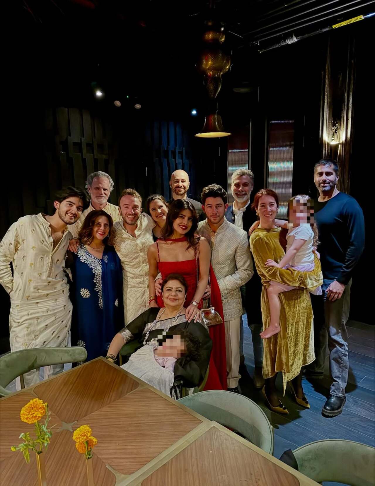 The whole family in one frame: Desi girl strikes a pose with her big family amid the festivities