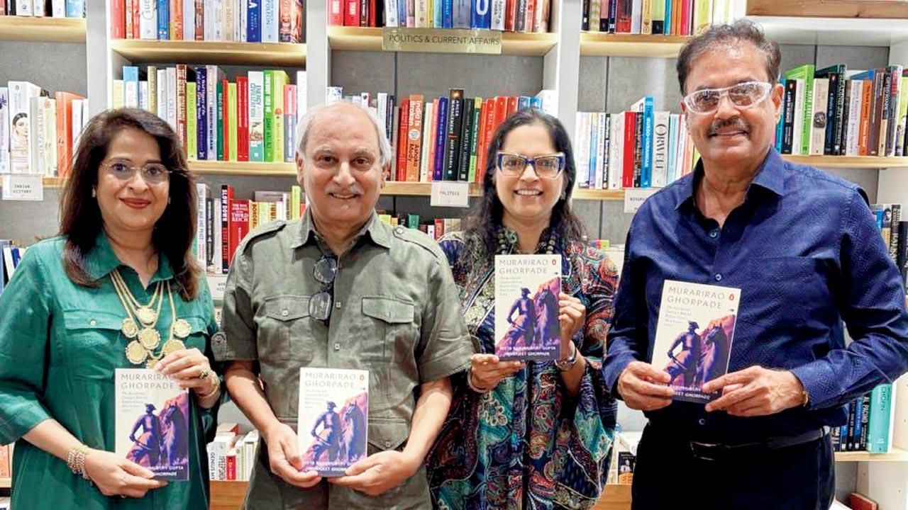The authors (centre), Indrajeet Ghorpade and Reetu Gupta, flanked by veteran cricketer  Dilip Vengsarkar and his wife Manali, at the book launch