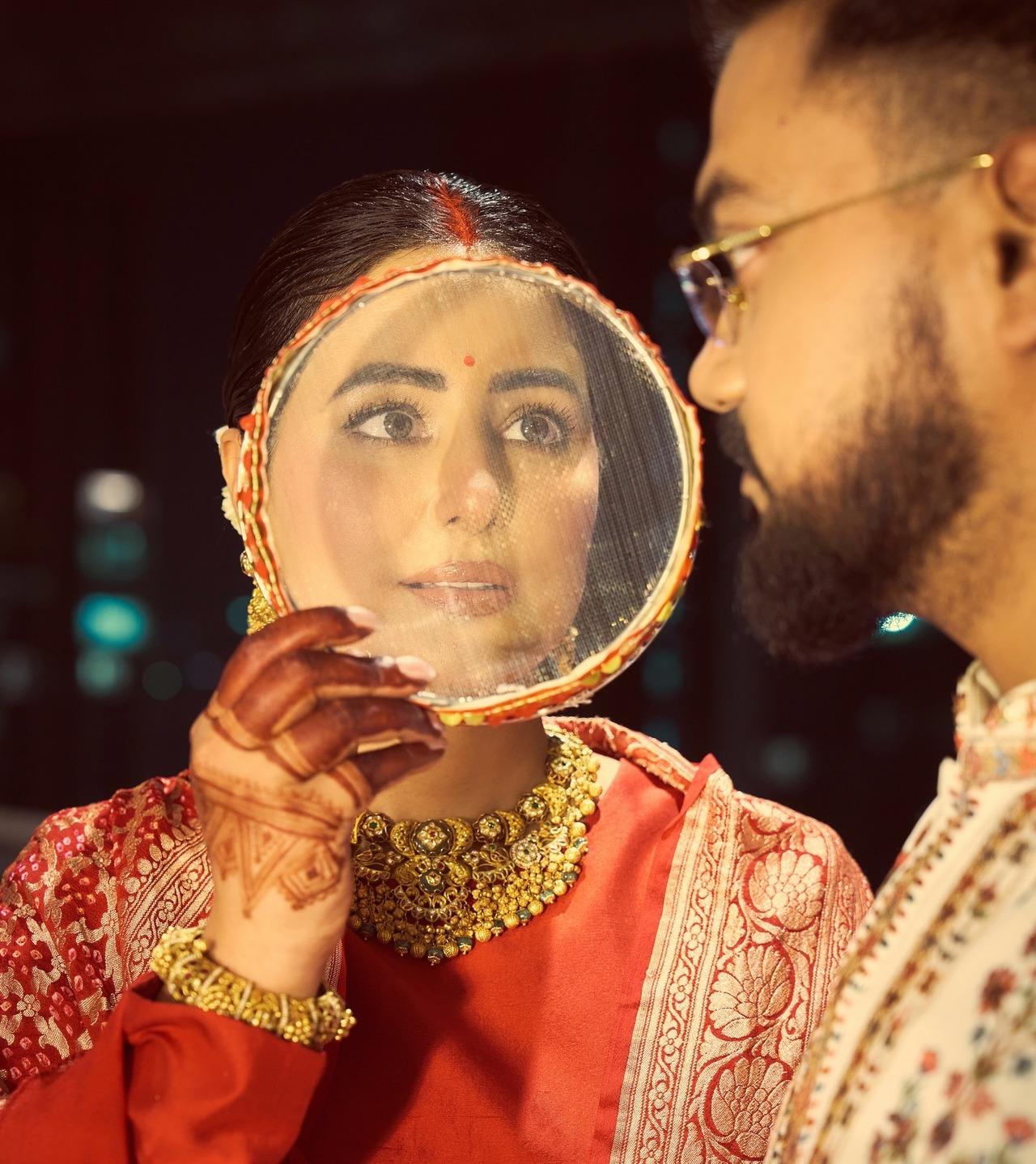 Hina Khan shared a series of photos from her first Karwa Chauth celebration after marriage with Rocky Jaiswal. 