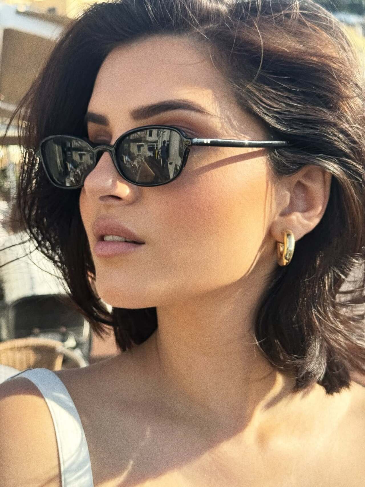 Tara gives a glimpse of her vacay look with those stunning sunglasses and minimal jewellery 