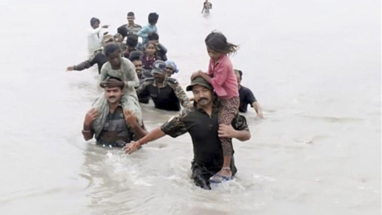 Rescue forces carry out evacuations in flood-affected areas of Rajasthan, ensuring the safety of residents amid heavy rains
