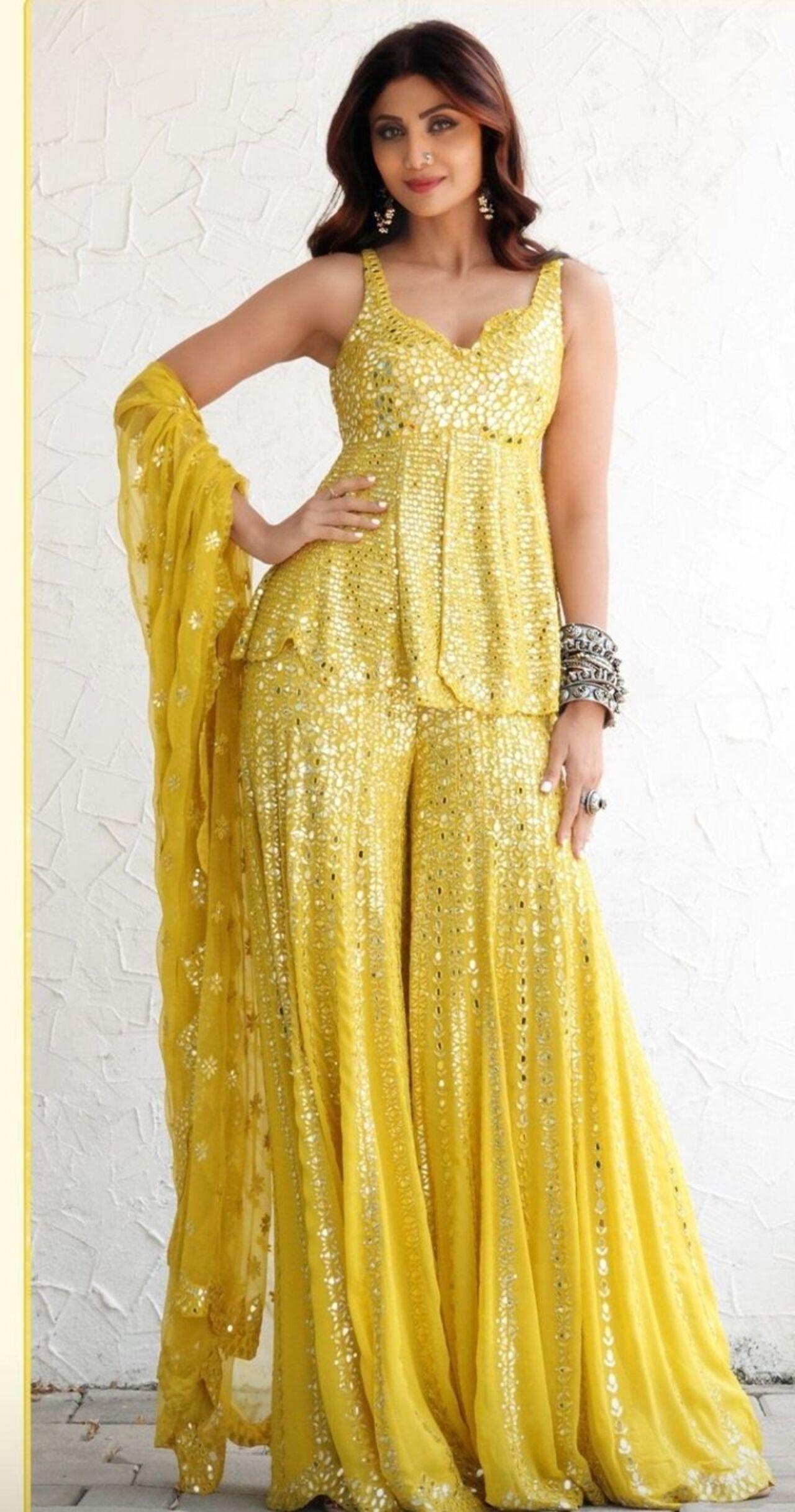 Shilpa Shetty Kundra’s fuss-free sharara set was crafted using lightweight georgette and completely doused in intricate mirror work.