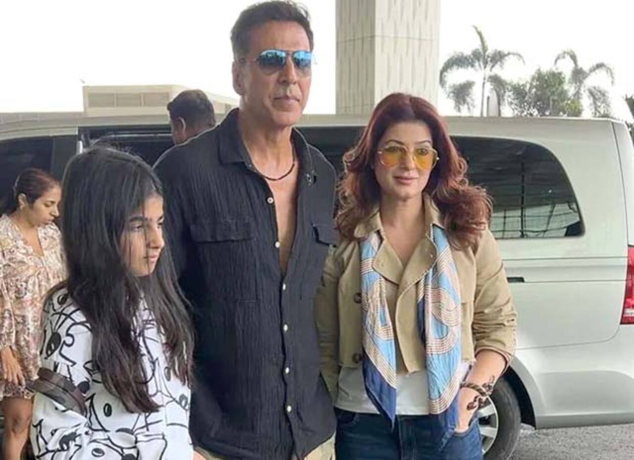 Akshay and Twinkle are seen accompanied by Nitara at the airport in this picture as they head out. The way Akshay hold his wife and daughter close while posing for the paps says it all.