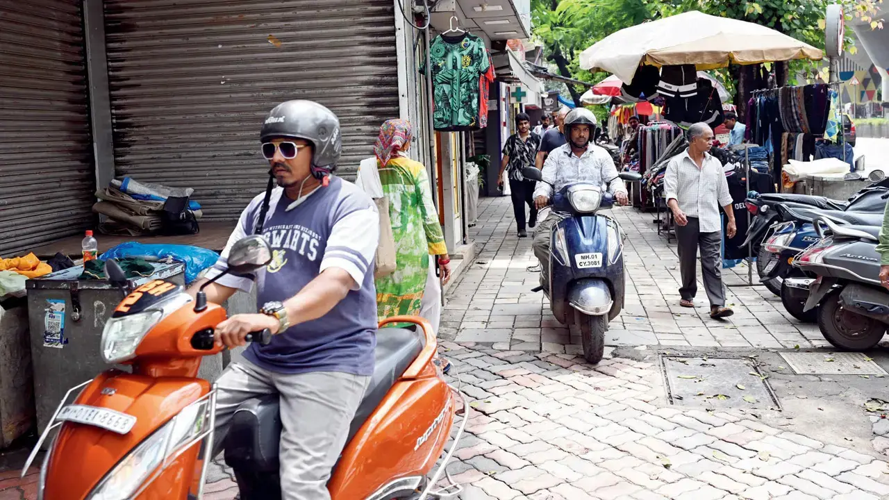 Two-wheelers encroaching footpaths is a citywide issue