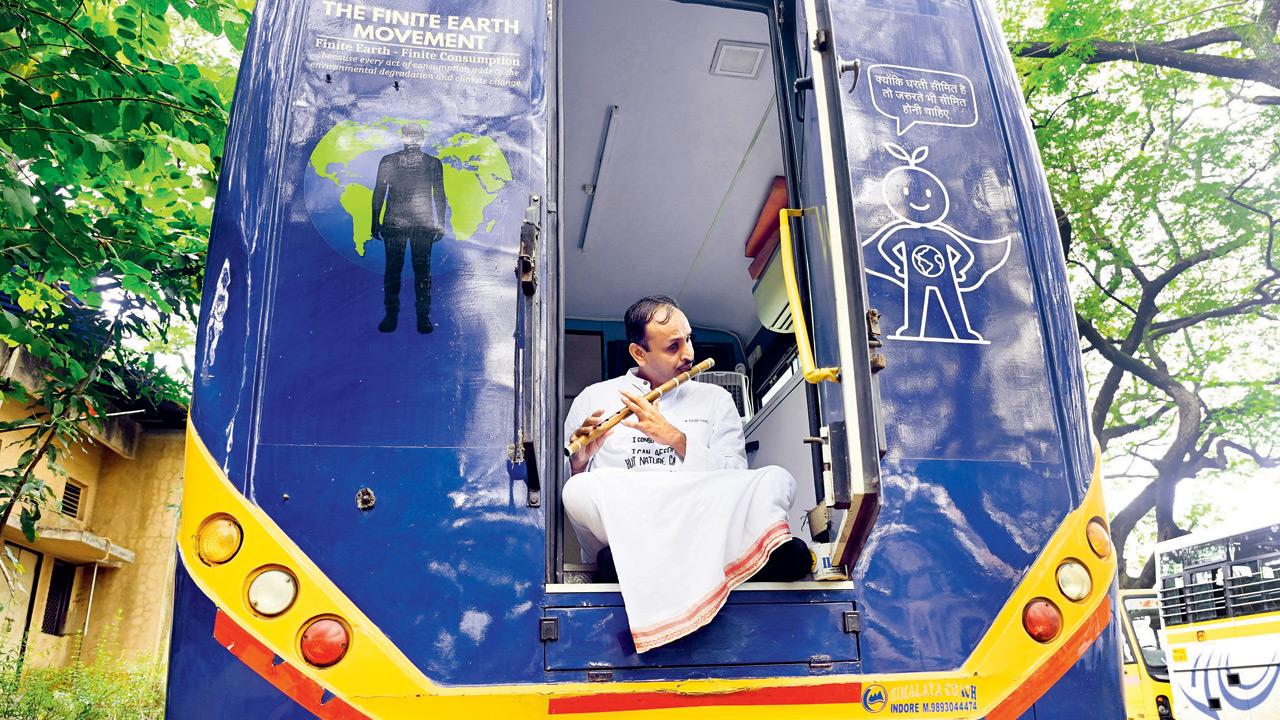 Seated at his favourite spot, Solanki plays a tune on his flute