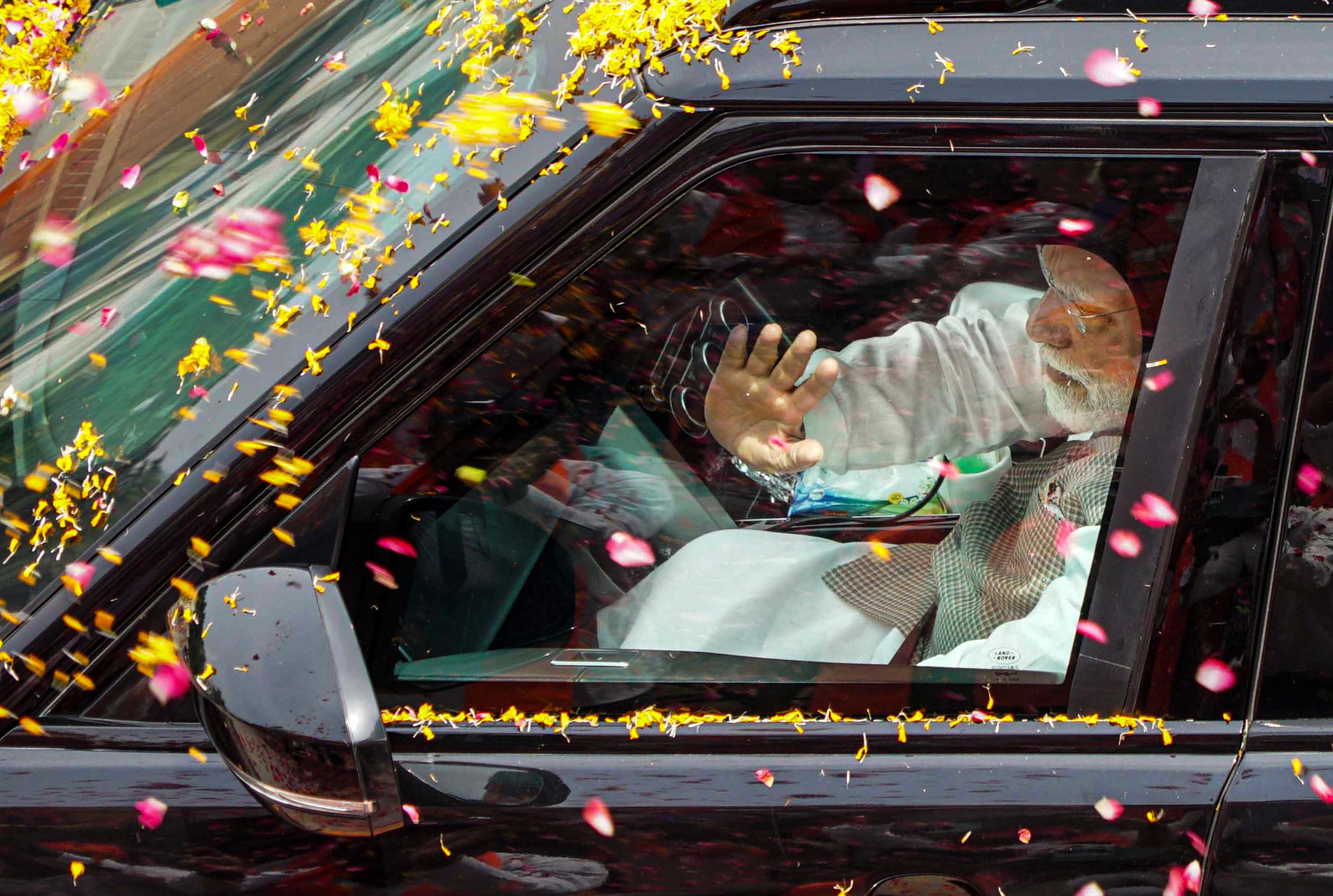 Flowers thrown at Prime Minister Narendra Modi's car during a roadshow, in Varanasi.