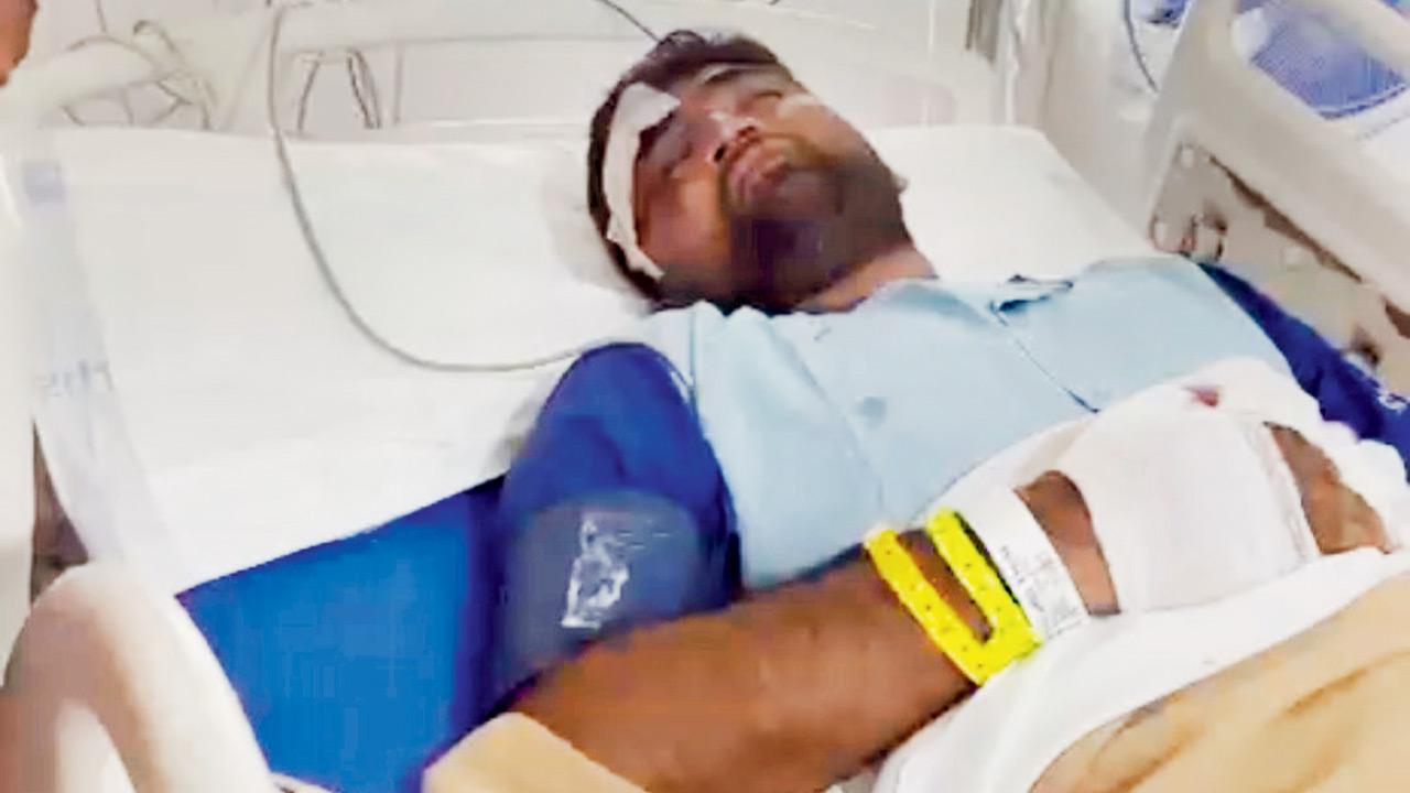 Mumbai: Helmet saves youth after pothole fall under cement truck